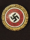 NSDAP 24 mm Golden Party badge un marked and numbered 92264